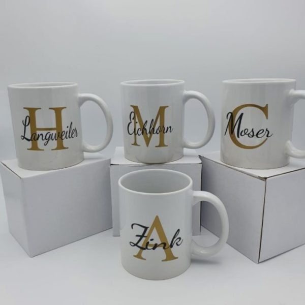 Personalisierte Tasse mit Wunschnamen und Buchstabe.